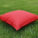 Red waterproof outdoor floor cushion 70x70 cm made of durable impertex fabric by Outex